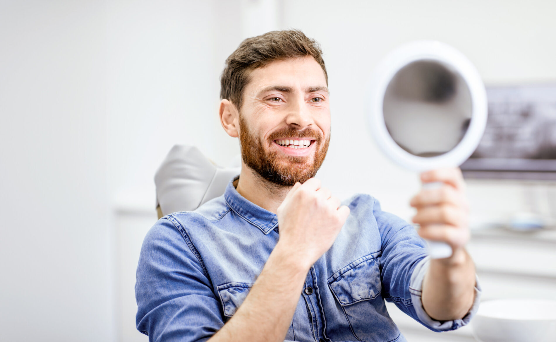 man's portrait in the dental office